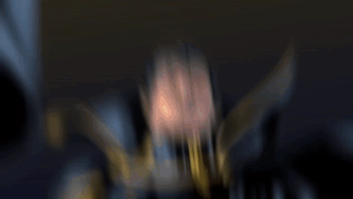 Blurry Man in Cape with Letter O