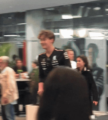 Blurry Man in Mercedes Shirt
