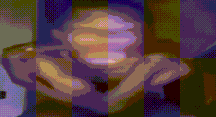 Blurry Man Making Face With Hands
