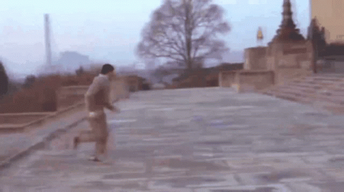 Blurry Man Running Down Staircase
