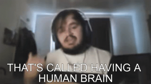 Blurry Man Wearing Headphones That's Called Having a Human Brain
