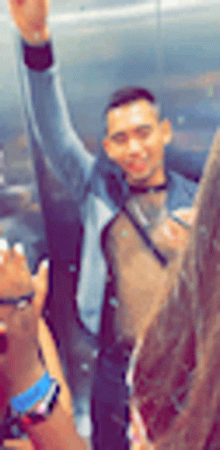 Blurry Man With Arm in Air
