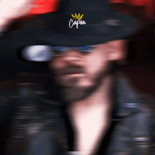 Blurry Man With Capon Hat and Sunglasses