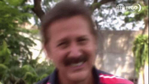 Blurry Man With Mustache TVGO Logo