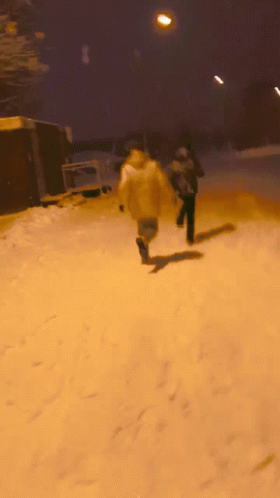 Blurry People Running in Snow