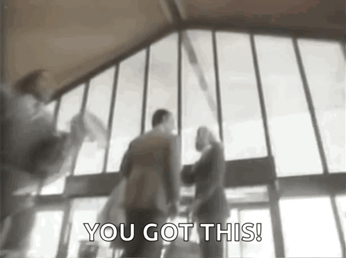 Blurry People Walking in Building Saying You Got This