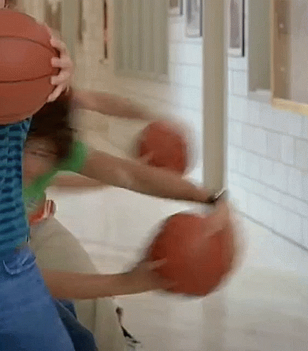Blurry Person Holding Basketball