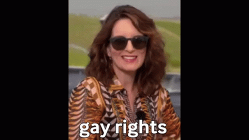 Blurry Person Holding Gun With Gay Rights
