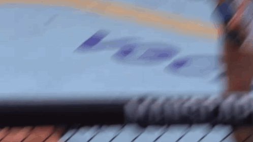 Blurry Person Holding Pencil with Laptop Saying I Love You