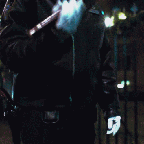 Blurry Person Holding Railing at Night