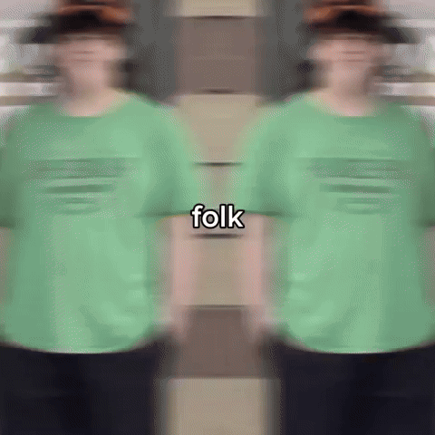 Blurry Person in Green Folk Shirt