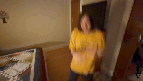 Blurry Person In Yellow Shirt Saying I Love You GIF
