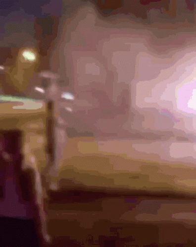 Blurry Person Standing in Front of Light