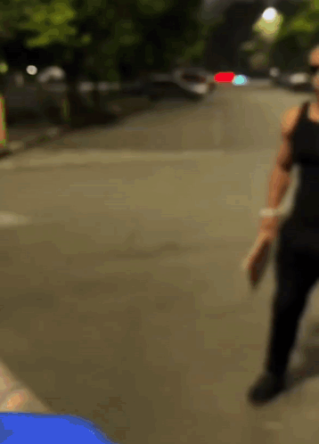 Blurry Person Walking Down Street