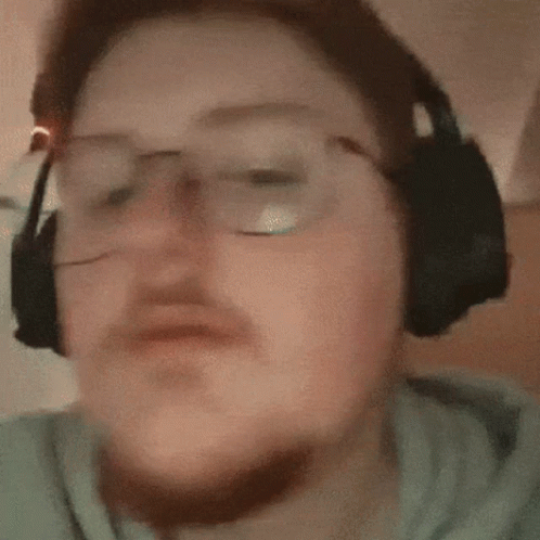 Blurry Person With Glasses