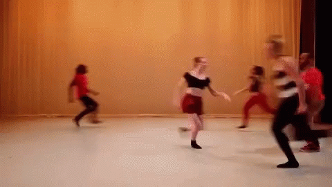 Blurry Photo Of People Dancing GIF