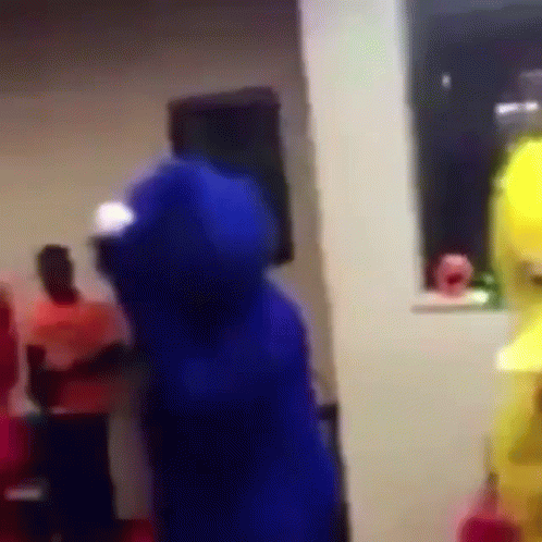 Blurry Photo of Person in Blue Hoodie
