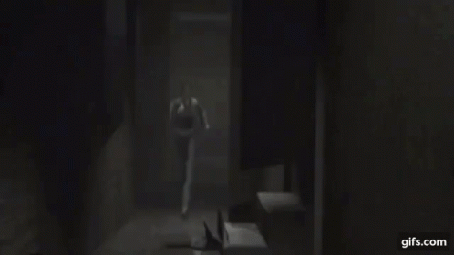 Blurry Picture of Woman's Face in Dark Room