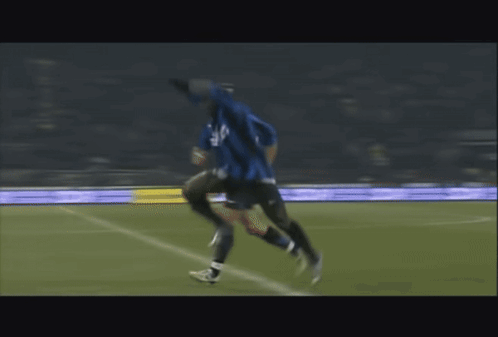 Blurry Soccer Player in Blue Jersey with P