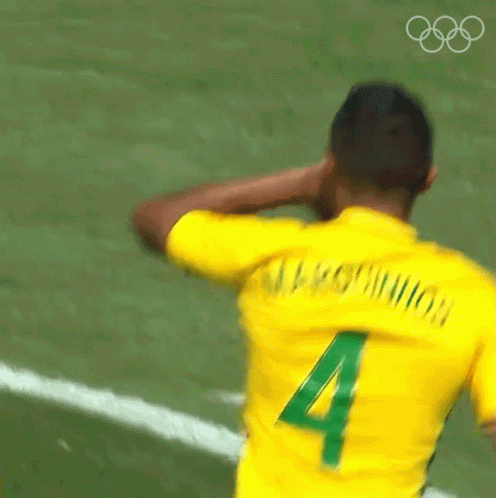 Blurry Soccer Player in Yellow Jersey Number 4