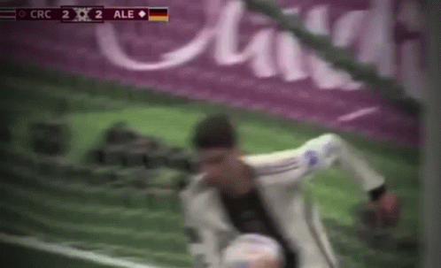 Blurry Soccer Player Kicking Ball