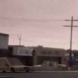 Blurry Street With Parked Cars