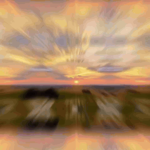 Blurry Sunset Sun Shining Through Clouds GIF
