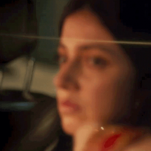 Blurry Woman Face With Glass GIF
