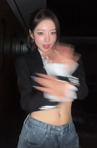 Blurry Woman in Black Jacket and Jeans