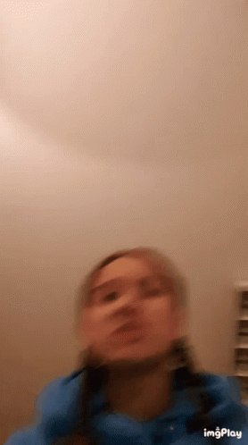 Blurry Woman's Face With Nose Bandage
