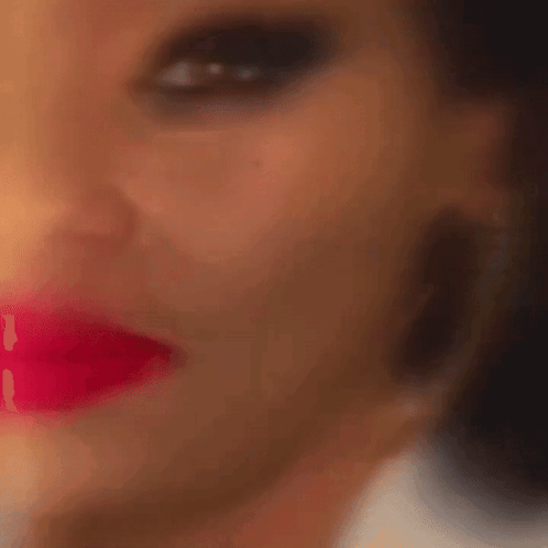 Blurry Woman's Face with Red Lips