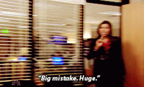 Blurry Woman Standing in Front of Window Saying Big Mistake Huge