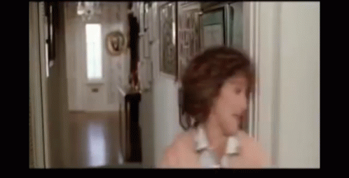 Blurry Woman Talking On Phone GIF