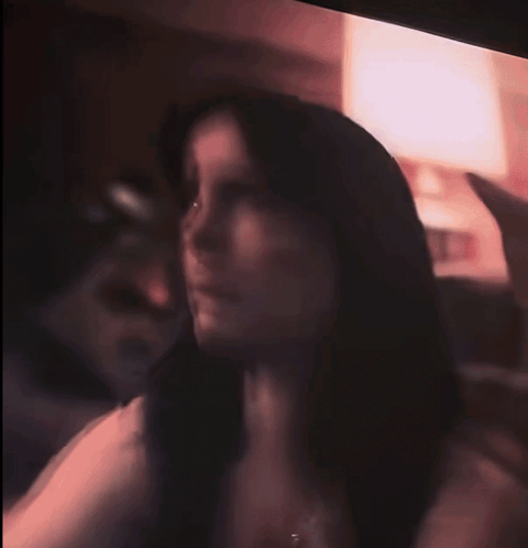 Blurry Woman With Hand on Face