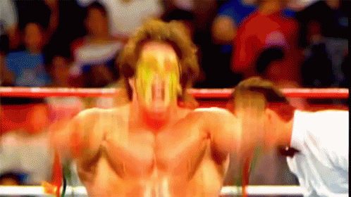 Blurry Wrestler in Yellow Mask