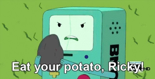 Bmo From Adventure Time Is Holding A Potato And Says " Eat Your Potato Ricky " GIF