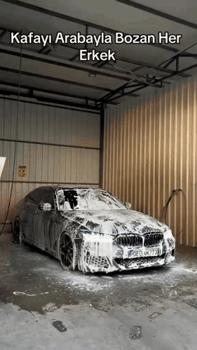 BMW Covered in Foam Saying Kafayi Arabayla Bozan Her Erkek
