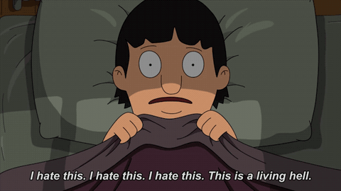 Bob From Bob 'S Burgers Is Laying In Bed With A Blanket Over His Head GIF