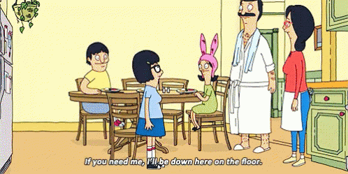 Bob's Burgers Family Standing Around Table