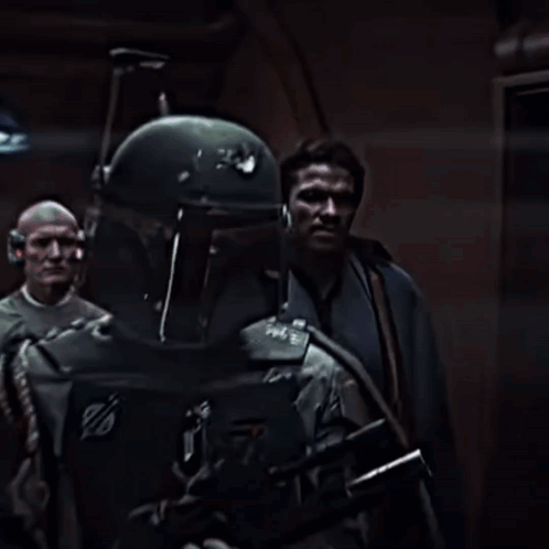 Boba Fett Is Holding A Gun In Front Of A Window GIF