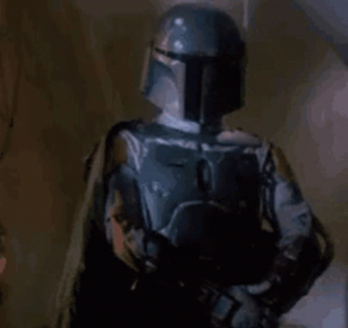 Boba Fett Star Wars Holding Gun in Dark Room
