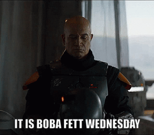 Boba Fett Wednesday Holding Helmet