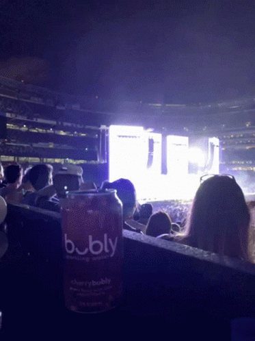 Bobly Cherry Bubbly Can in Crowded Stadium