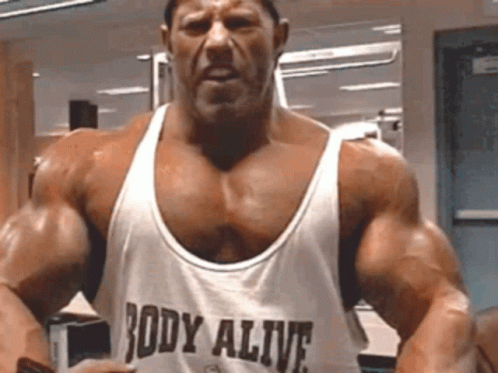 Bodybuilder in White Tank Top