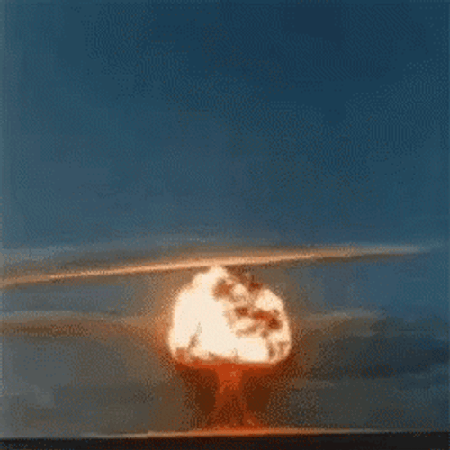 Bomb Explosion Erupting In Fiery Cloud GIF
