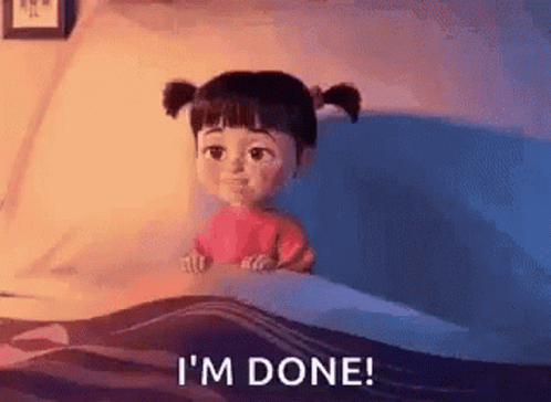 Boo From Monsters Inc Is Sitting In A Bed With The Words `` I 'M Done '' Written On The Bottom . GIF