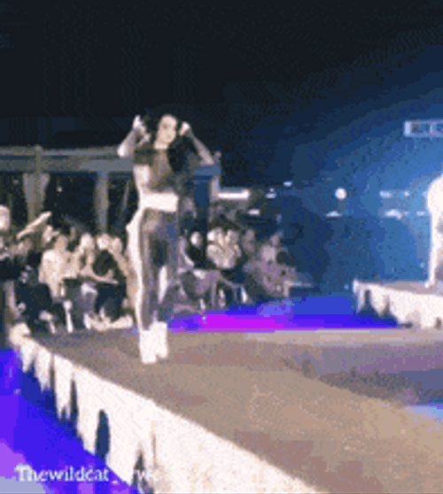 Boss Lady Posing On Stage GIF