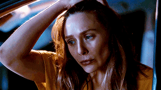 Bothered Elizabeth Olsen In Car GIF