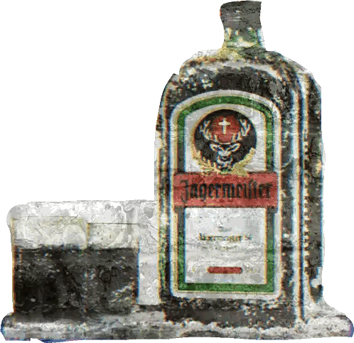 Bottle of Jagermeister Next to Glass
