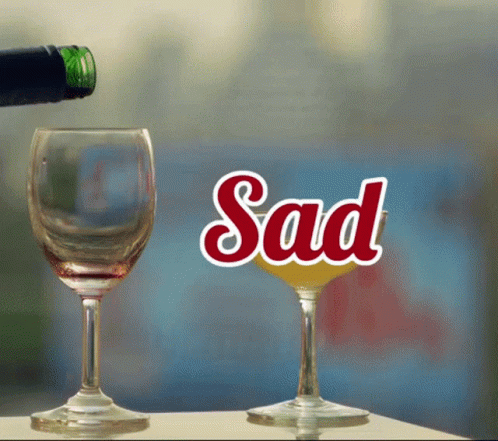 Bottle of Wine Pouring Into Glass Saying Sad